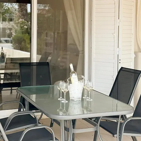 Holiday home 5-min Walk To - Bright 2-br With Private Garden & Sunset Views